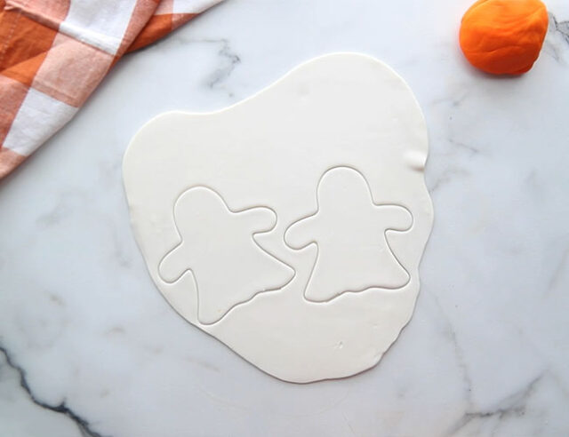 Roll out fondant and use cookie cutter
