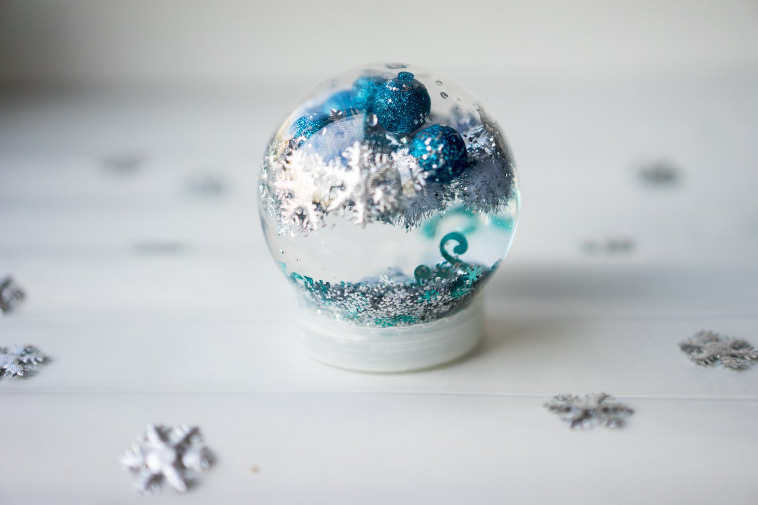 DIY Snow Globe Sensory Jar • Capturing Parenthood