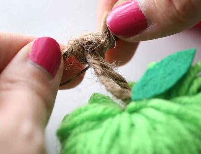 Tie each apple to garland twine