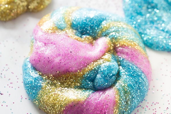 Glittery Kid-Safe Elmer's Unicorn Slime Recipe - Happy Hooligans