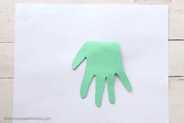 Cut out handprint and glue down