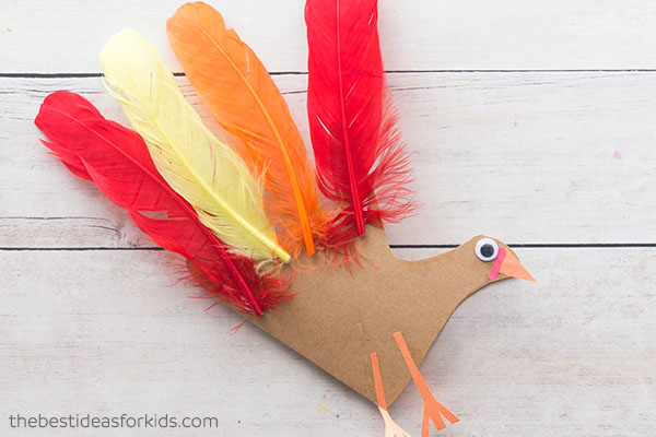 Make hand-print turkeys from colored paper - Projects for Preschoolers