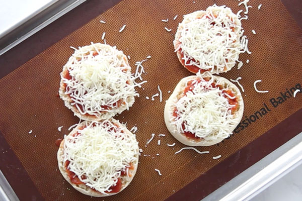 Add Cheese to English Muffin Pizza