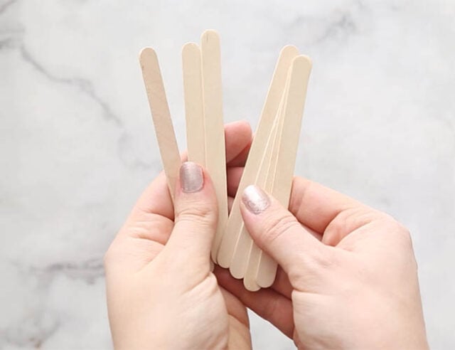 Get 7 popsicle sticks