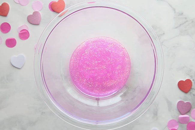 Valentine Slime Add Glue to Bowl