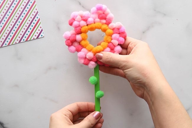 Glue Pom Pom Flower to Popsicle Stick