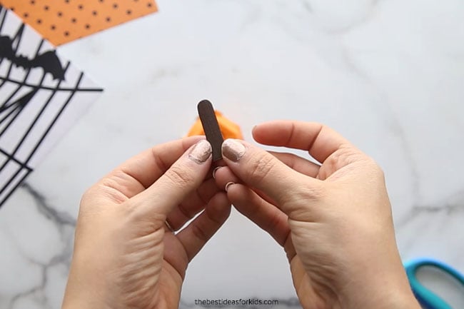 Cut Popsicle Stick for Pumpkin Egg carton