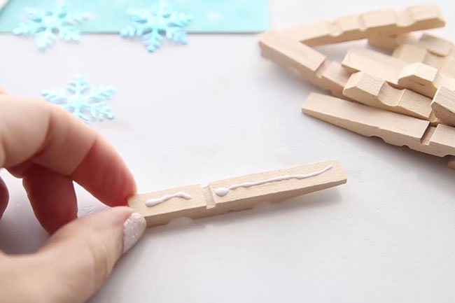 Glue Clothespins Together for Snowflakes
