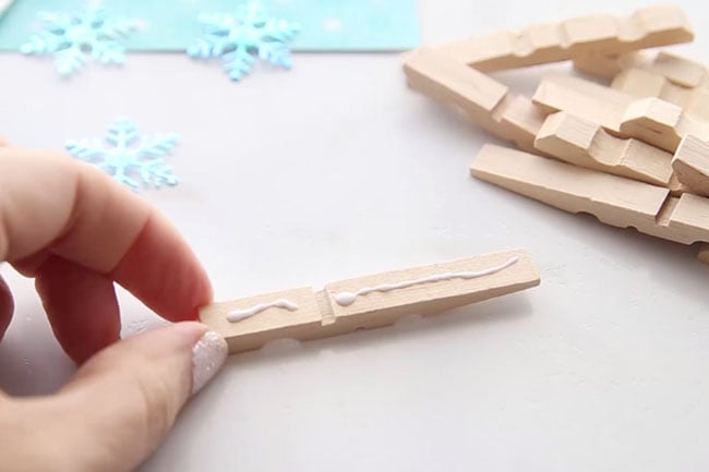 Glue Clothespins Together for Snowflakes