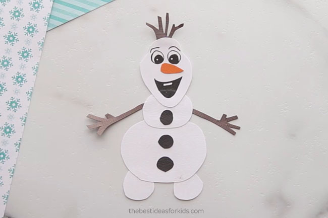 Glue on Olaf Buttons to Bookmark