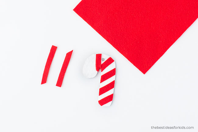 Make candy cane cardboard ornament