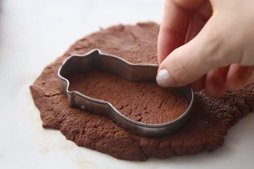 Put Cookie Cutter into Cinnamon Dough