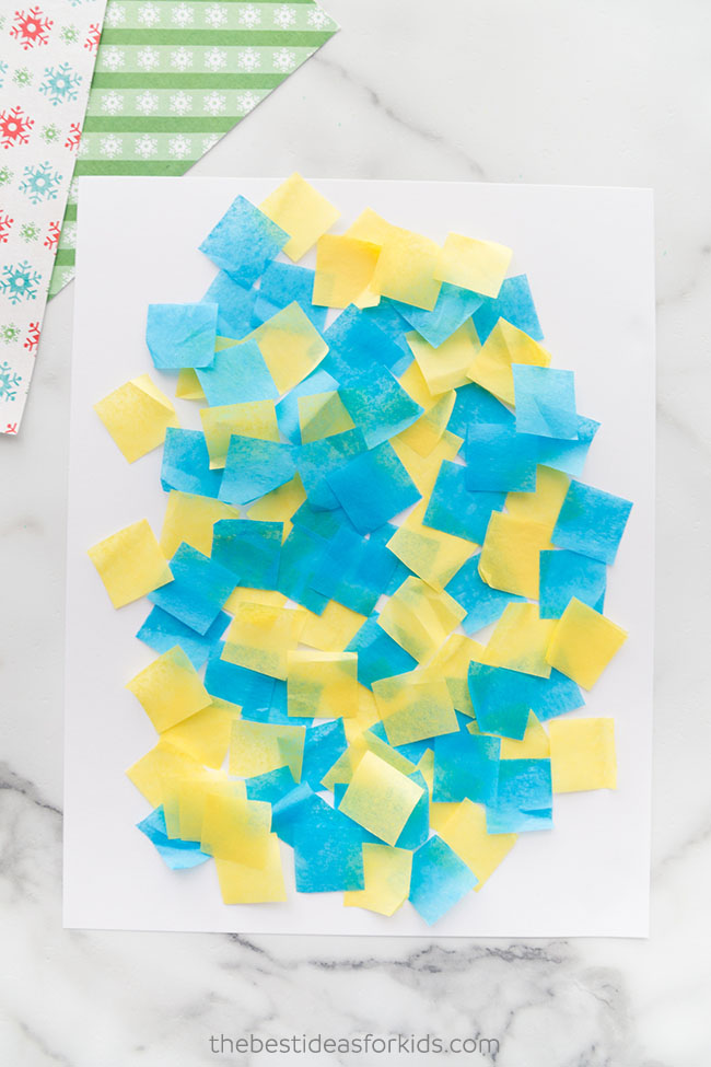 Put down tissue paper for Christmas art