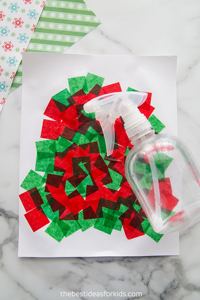 Soak tissue paper with water for Christmas art