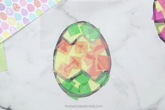 Add Laminating paper on top of Easter Suncatcher