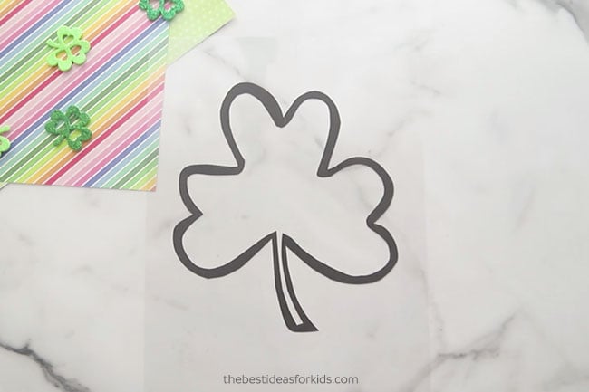 Place Shamrock on Laminating Paper