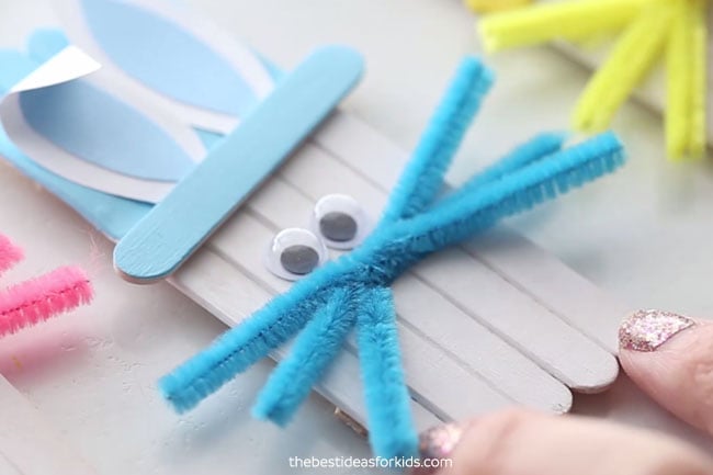 Glue Pipe Cleaner to Popsicle Stick Bunny