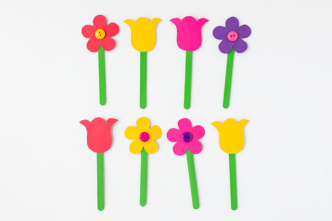 Glue Flowers to top of Popsicle Sticks
