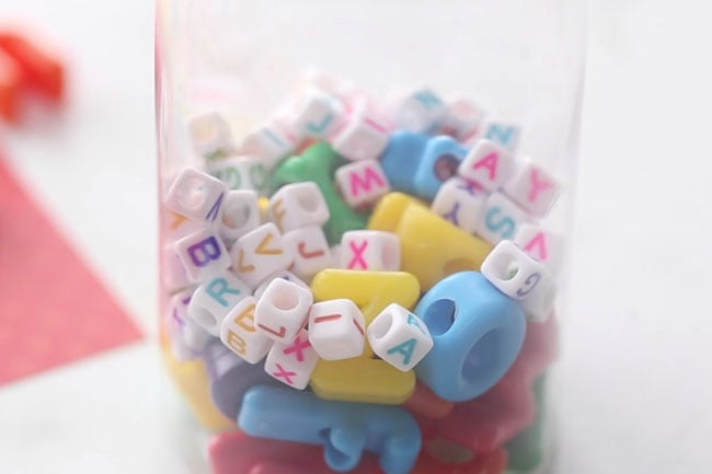 Add beads into bottle