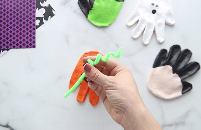 Add pipe cleaner pumpkin