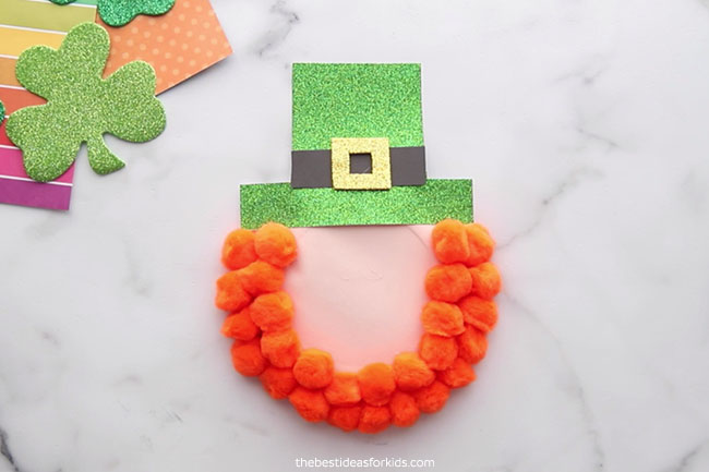 Glue Pom Poms on Leprechaun