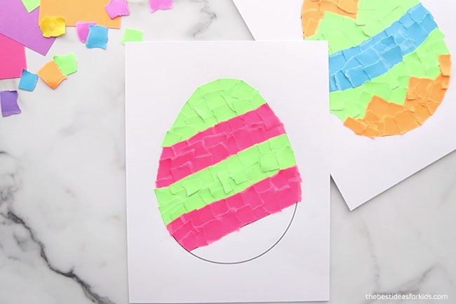 Keep gluing paper strips to egg template