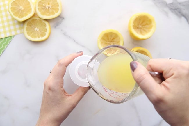 Pour Lemon Juice Into Squeeze Bottle