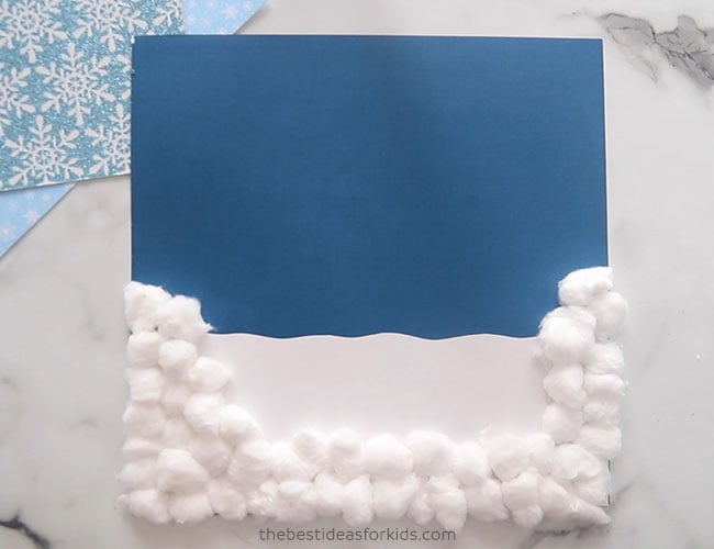 Glue Cotton Balls to Blue Paper