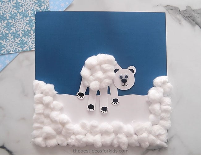 Glue Polar Bear Handprint to Blue Paper