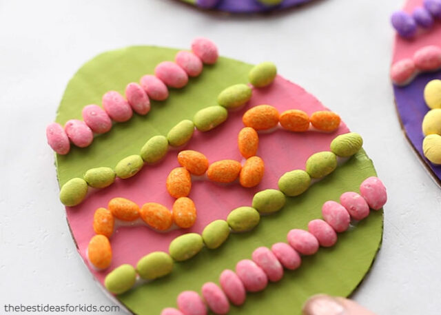 Glue on Beans to Cardboard Easter Eggs