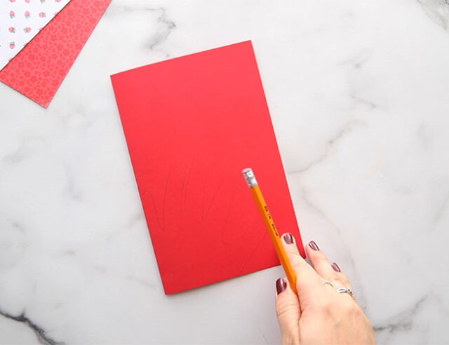 Trace Handprint on Red Paper