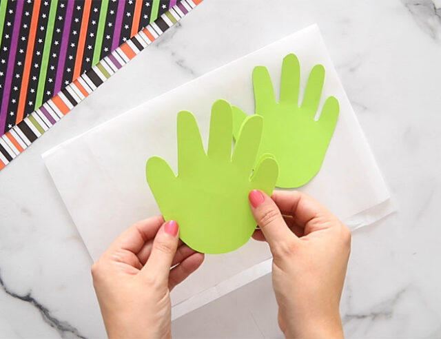 Cut out green handprints