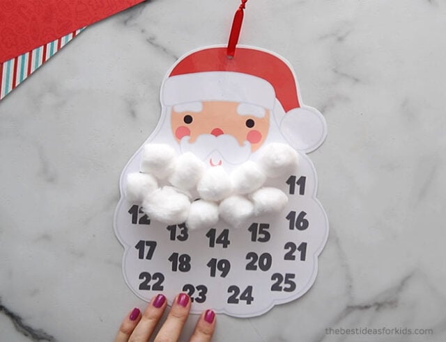 Continue Adding Cotton Balls to Santa