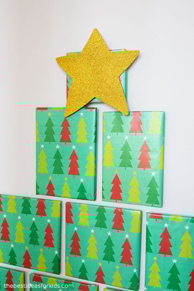 Star on top of book Christmas Tree