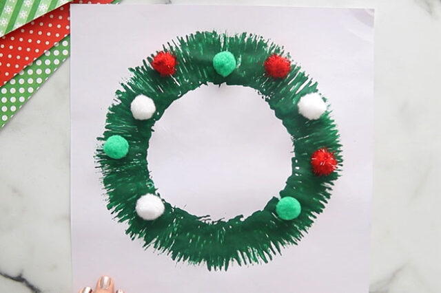 Glue Pom Poms onto Wreath