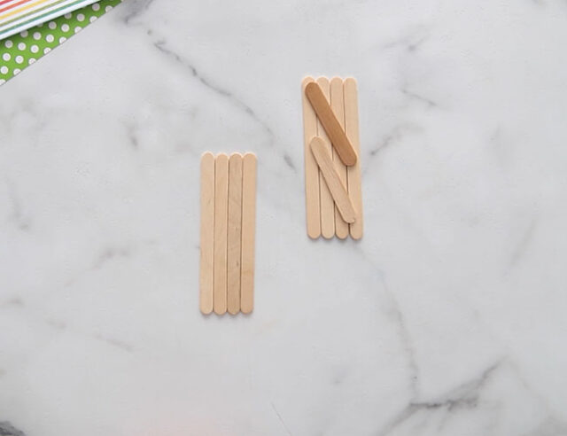 Glue popsicle sticks together