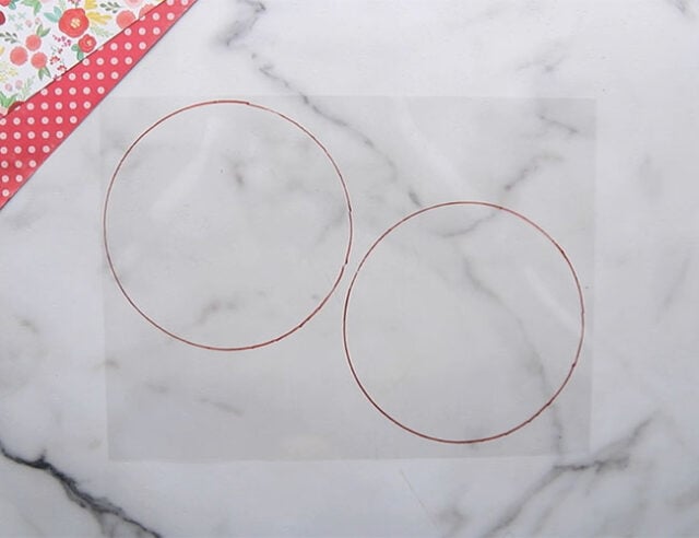 Trace 2 circles on laminate paper