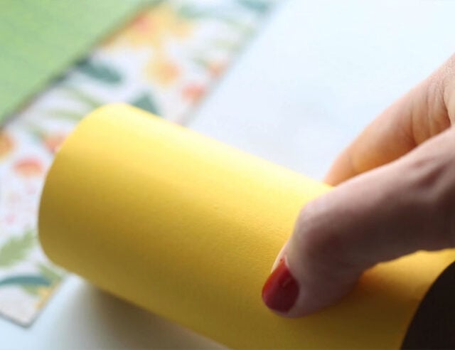 Wrap paper roll in yellow paper