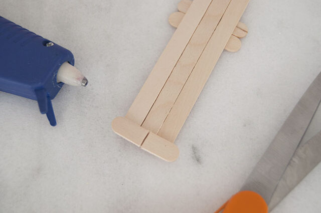 Cutting and gluing popsicle feet