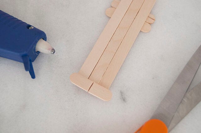 Cutting and gluing popsicle feet