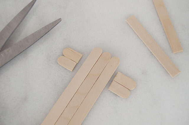 Cutting popsicle sticks for hair