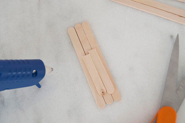 Gluing popsicle sticks together