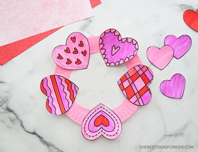 Glue large hearts to paper plate