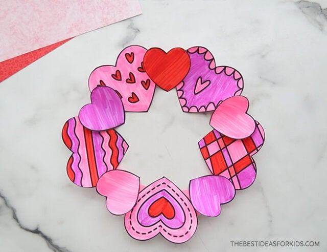 Glue small hearts to paper plate