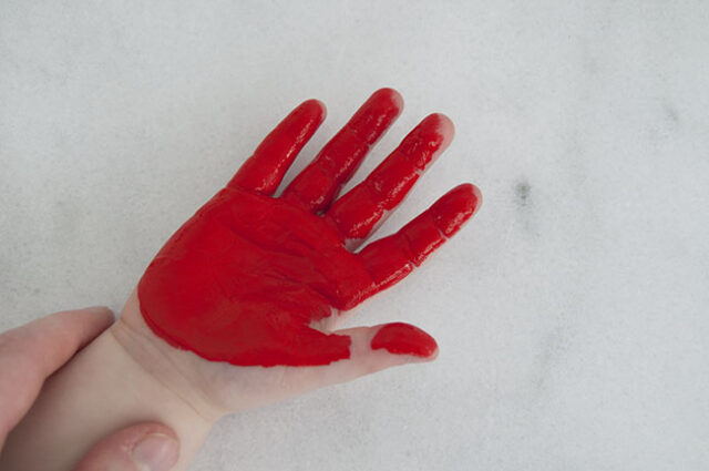 Paint child's hand