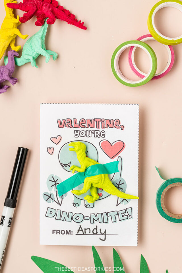 Tape dinosaur toy on card