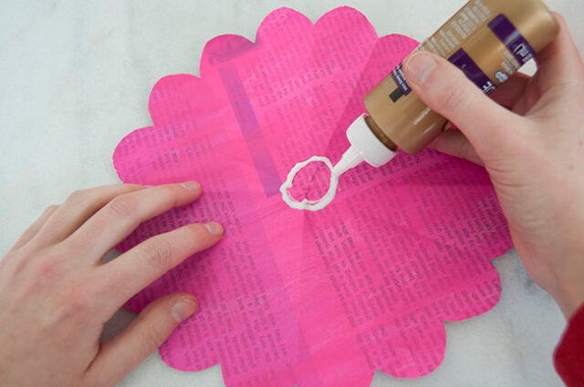 Applying glue to big flower