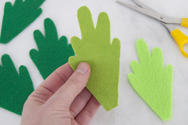 Cutting out felt carrot tops