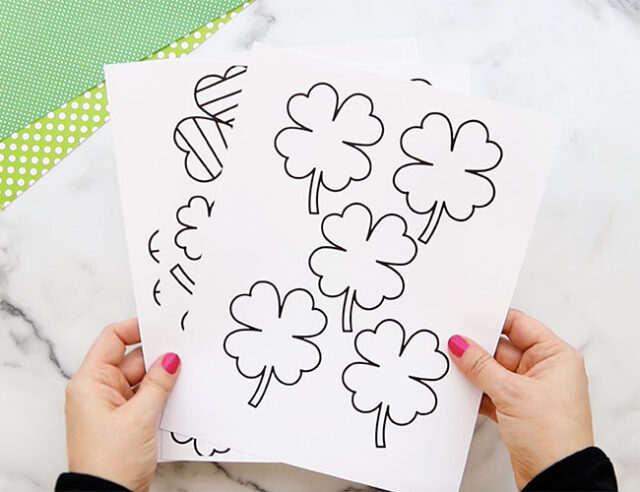 Holding clover printables