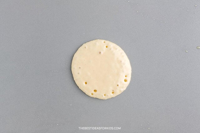 small pancake on griddle